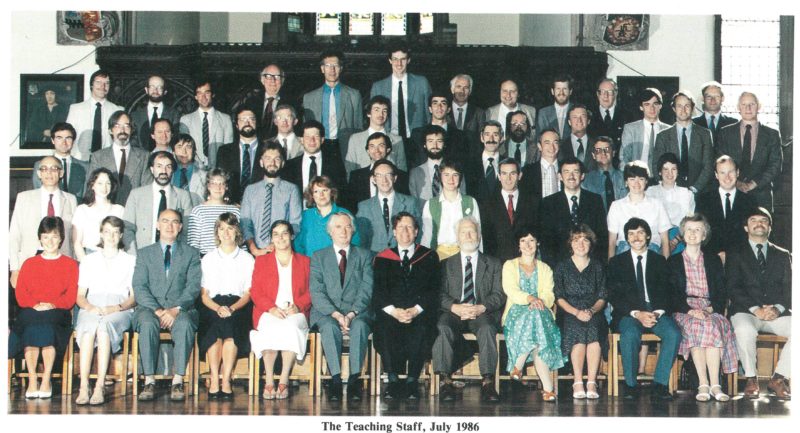 1986-staff-photo-with-MGR-crop.jpeg#asset:3613:rtaImage