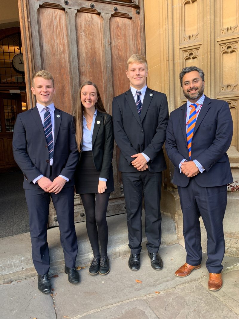 Cara, Oskar and Angus with Headmaster Jaideep Barot, after the assembly